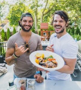 Brian Mazza and friend with Freshly Cooked meal