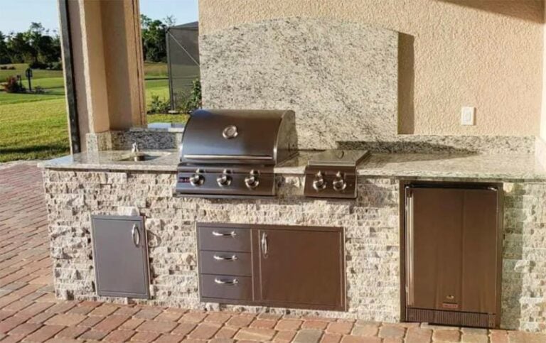 blaze grill and appliances built into an outdoor kitchen