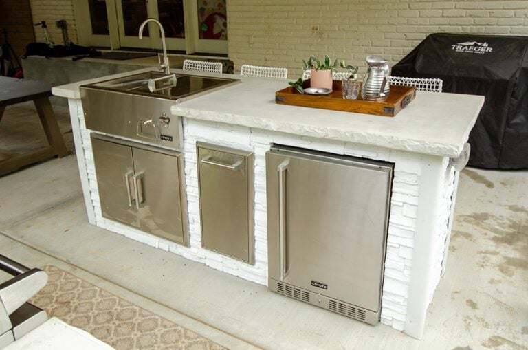 Coyote built in outdoor refrigerator in a linear rta bar island