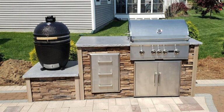 small outdoor kitchen with kamado smoker