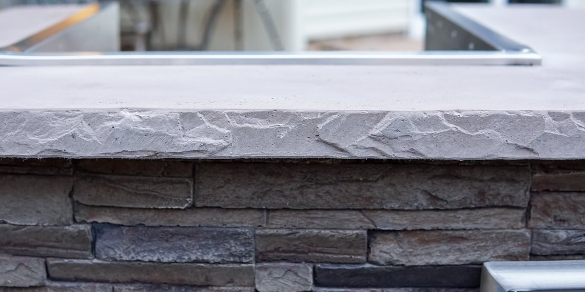 close up of concrete outdoor kitchen countertops