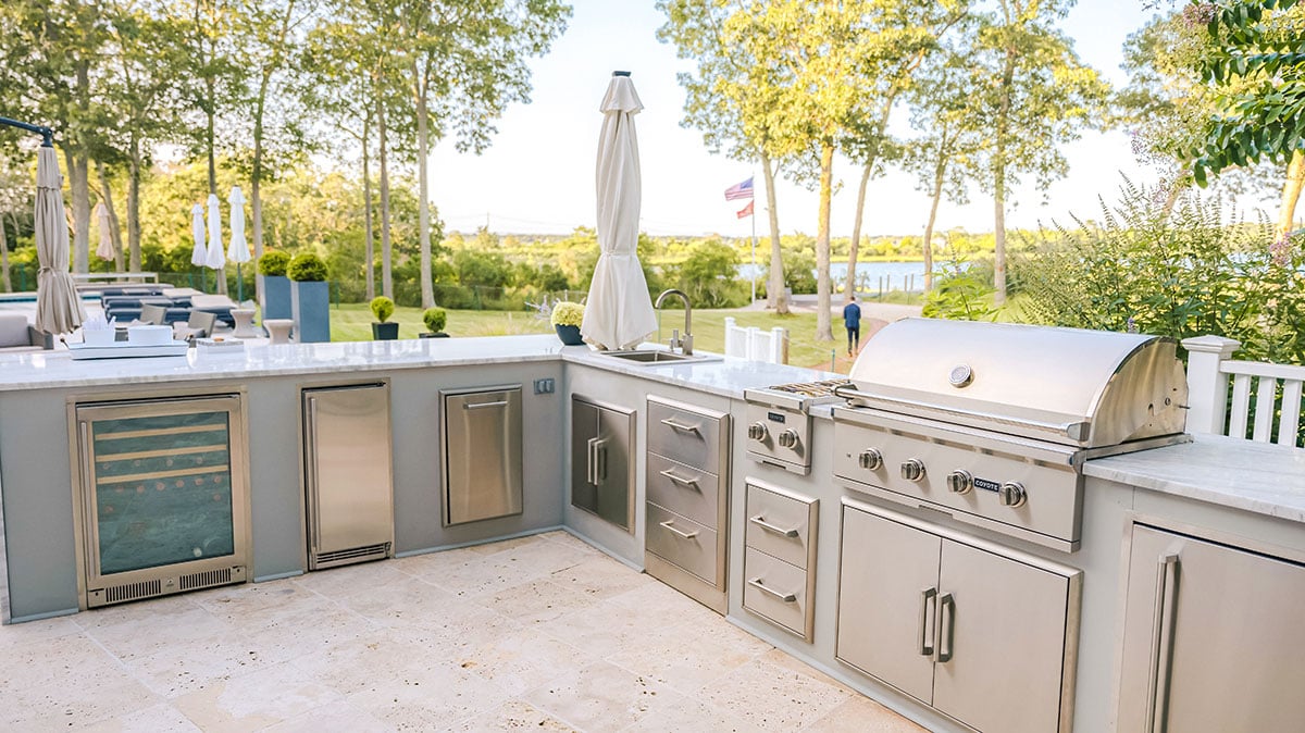 stucco modern outdoor kitchen on shoreline