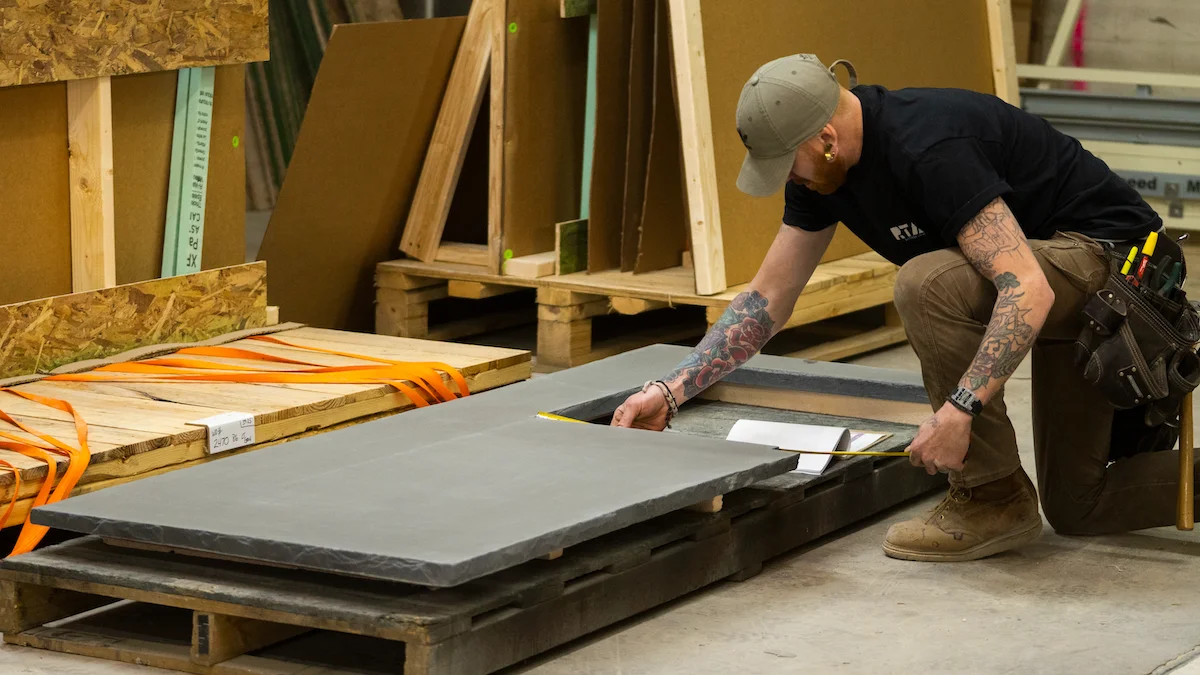 person working on rta outdoor kitchen