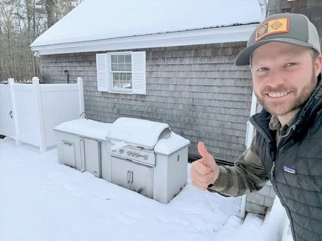 rta outdoor kitchen covered in snow